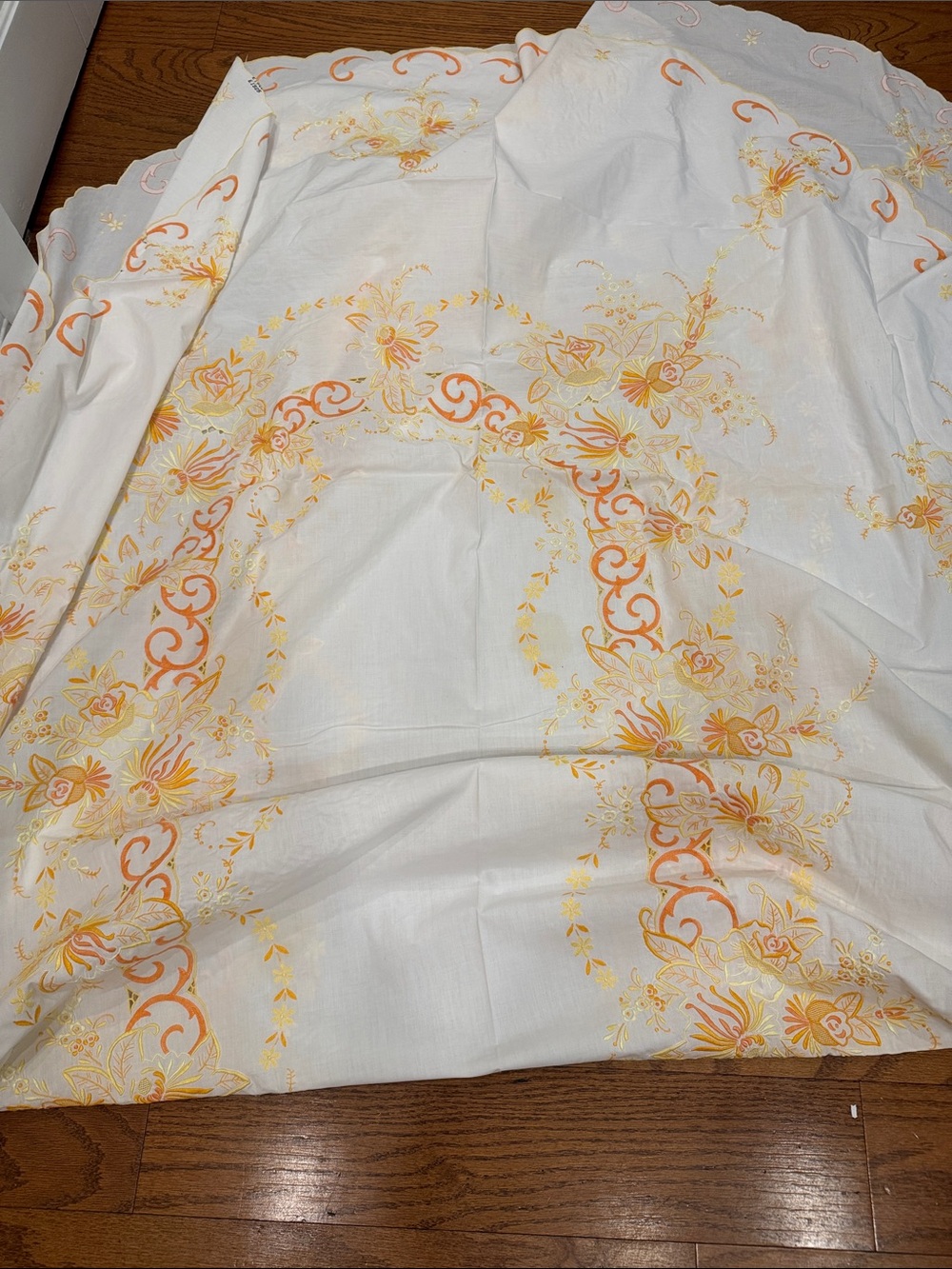 White vintage Tablecloth W/ Orange & Yellow Floral  Design. Size 114x64